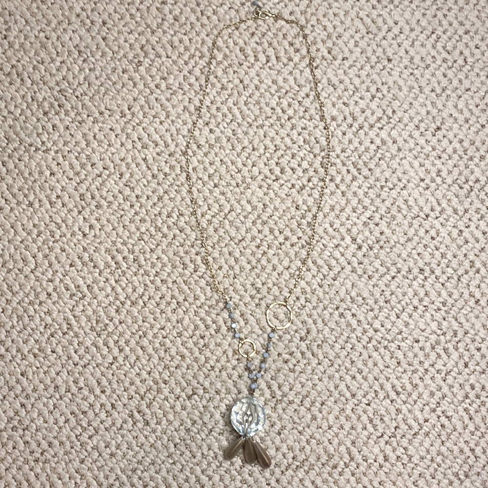 Anthropologie statement necklace. Gold chain w/ light blue stones.